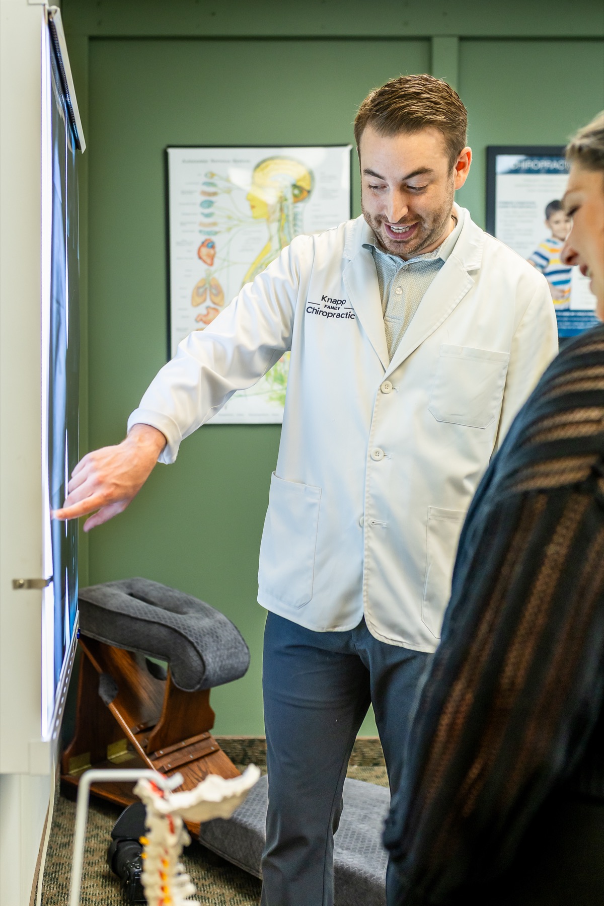 Dr. Knapp talking through exam findings with a patient